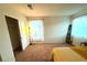 Bright bedroom with a queen-size bed and large closet at 2609 Via Napoli, Henderson, NV 89044