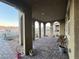 Covered patio with brick pavers and mountain views at 2609 Via Napoli, Henderson, NV 89044