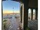 Covered entryway with arched columns and brick pavers at 2609 Via Napoli, Henderson, NV 89044