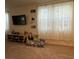 Spacious living room with large TV and comfortable seating at 2609 Via Napoli, Henderson, NV 89044