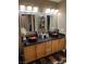 Elegant bathroom with double sinks, modern fixtures, and a spacious vanity at 2925 Wigwam Pkwy # 2021, Henderson, NV 89074