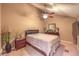 Main bedroom with a ceiling fan and updated furnishings at 2925 Wigwam Pkwy # 2021, Henderson, NV 89074