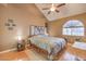 Spacious bedroom with vaulted ceiling and wood floors at 2925 Wigwam Pkwy # 2021, Henderson, NV 89074