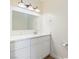 Bathroom with white cabinets and quartz countertop at 412 Vassar Ln, Las Vegas, NV 89107