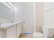 Bright bathroom with white cabinets and quartz countertop at 412 Vassar Ln, Las Vegas, NV 89107