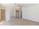 Well-lit bedroom with mirrored closet doors and ceiling fan at 412 Vassar Ln, Las Vegas, NV 89107