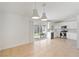 Open dining area with view of the kitchen and backyard at 412 Vassar Ln, Las Vegas, NV 89107