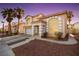 Charming two-story home featuring desert landscaping, a two car garage, and classic architecture at 8737 Autumn Valley Ave, Las Vegas, NV 89129