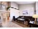 Open-concept living room with high ceilings, tile flooring, and large windows for plenty of light at 8737 Autumn Valley Ave, Las Vegas, NV 89129