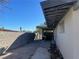 Backyard featuring a patio area, block wall, with a covered outdoor grilling area, perfect for entertaining at 1812 Ryan Ave, Las Vegas, NV 89101