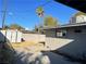 Backyard featuring a shed and block wall, showcasing the outdoor space and storage options at 1812 Ryan Ave, Las Vegas, NV 89101