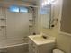 Bathroom with a shower/tub, and a vanity with mirror and lighting at 1812 Ryan Ave, Las Vegas, NV 89101