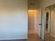 Well-lit bedroom features mirrored closet and entryway to adjacent room at 1812 Ryan Ave, Las Vegas, NV 89101