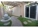 Charming backyard space featuring a walkway and water feature, perfect for outdoor relaxation at 427 Norridgewock St, Henderson, NV 89074