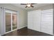 Bedroom with a Murphy bed, built in shelving, and access to the outside at 427 Norridgewock St, Henderson, NV 89074