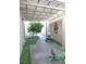 Private courtyard with pergola, sphere fountain and desert-inspired landscape at 427 Norridgewock St, Henderson, NV 89074