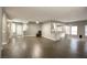Large living space with hardwood floors, neutral walls, and an open-concept design at 427 Norridgewock St, Henderson, NV 89074