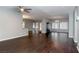 Spacious living room with hardwood floors, neutral walls, and ample natural light at 427 Norridgewock St, Henderson, NV 89074