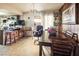 Dining area with a wooden table and access to the backyard at 4245 Seville St, Las Vegas, NV 89121