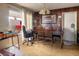 Dining area with a wooden table and access to the backyard at 4245 Seville St, Las Vegas, NV 89121
