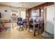 Dining area with a wooden table and access to the backyard at 4245 Seville St, Las Vegas, NV 89121