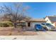 Single story home with attached garage and landscaping at 4245 Seville St, Las Vegas, NV 89121