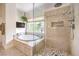 Bathroom with a large shower and soaking tub at 1590 Sabatini Dr, Henderson, NV 89052