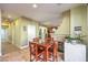 Dining area with table and chairs, near kitchen and fireplace at 1590 Sabatini Dr, Henderson, NV 89052