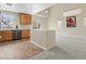 An open concept kitchen that features stainless steel appliances, wooden cabinets, and an island at 3023 Sunset Harbor Ct, North Las Vegas, NV 89031