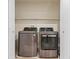 A closet that features a gray washing machine and dryer at 3023 Sunset Harbor Ct, North Las Vegas, NV 89031