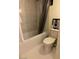 Bathroom showcasing a marble tiled shower over tub with decorative shower curtain at 3077 Pinehurst Dr # A, Las Vegas, NV 89109