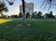 Expansive golf course featuring lush green grass, mature trees, and a high-rise building in the distance at 3077 Pinehurst Dr # A, Las Vegas, NV 89109