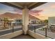 Balcony with stunning sunset and community views at 4024 Desert Trace Ct, Las Vegas, NV 89129