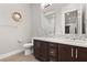 Elegant bathroom with double vanity and tile accents at 4024 Desert Trace Ct, Las Vegas, NV 89129