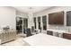 Modern kitchen with breakfast nook and quartz countertops at 4024 Desert Trace Ct, Las Vegas, NV 89129