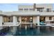 Resort-style pool with a view of the home's interior at 4024 Desert Trace Ct, Las Vegas, NV 89129