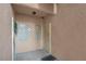 Condo building entry with doors to units 106 and 107 at 5751 E Hacienda Ave # 107, Las Vegas, NV 89122