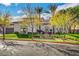 Luxury home with a tree-lined street and walkway at 1529 Villa Rica Dr, Henderson, NV 89052