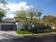 Single-story house with tile roof, attached garage, and landscaped yard at 1529 Villa Rica Dr, Henderson, NV 89052