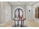 Grand foyer featuring decorative double doors, tiled floor and stylish decor at 1529 Villa Rica Dr, Henderson, NV 89052