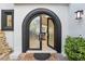 Arched double front door with etched glass, welcoming entryway at 1529 Villa Rica Dr, Henderson, NV 89052