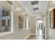 Bright hallway with hardwood floors and neutral wall tones at 1529 Villa Rica Dr, Henderson, NV 89052