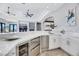 Modern kitchen features a white quartz countertop and stainless steel appliances at 1529 Villa Rica Dr, Henderson, NV 89052