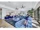 Sun-drenched living room showcasing a comfortable sectional sofa and large windows at 1529 Villa Rica Dr, Henderson, NV 89052