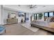 Large main bedroom with ceiling fan, fireplace, and french doors leading to the patio at 1529 Villa Rica Dr, Henderson, NV 89052