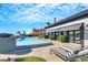 Pool area with lounge chairs, a pool, and stylish back patio at 1529 Villa Rica Dr, Henderson, NV 89052