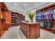 Custom walk-in closet featuring hardwood cabinets, drawers, and ample clothing storage at 1529 Villa Rica Dr, Henderson, NV 89052