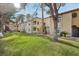 Attractive exterior of a two-story condominium building with manicured landscaping at 3145 E Flamingo Rd # 1045, Las Vegas, NV 89121