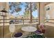 Private patio with table and chairs, overlooking the community at 3145 E Flamingo Rd # 1045, Las Vegas, NV 89121