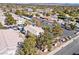 Aerial view of the community buildings, parking area and lush greenery for a suburban environment at 3425 E Russell Rd # 240, Las Vegas, NV 89120